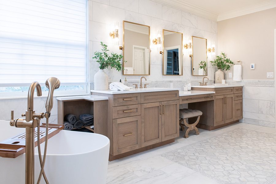 Elegant primary bathroom with freestanding tub