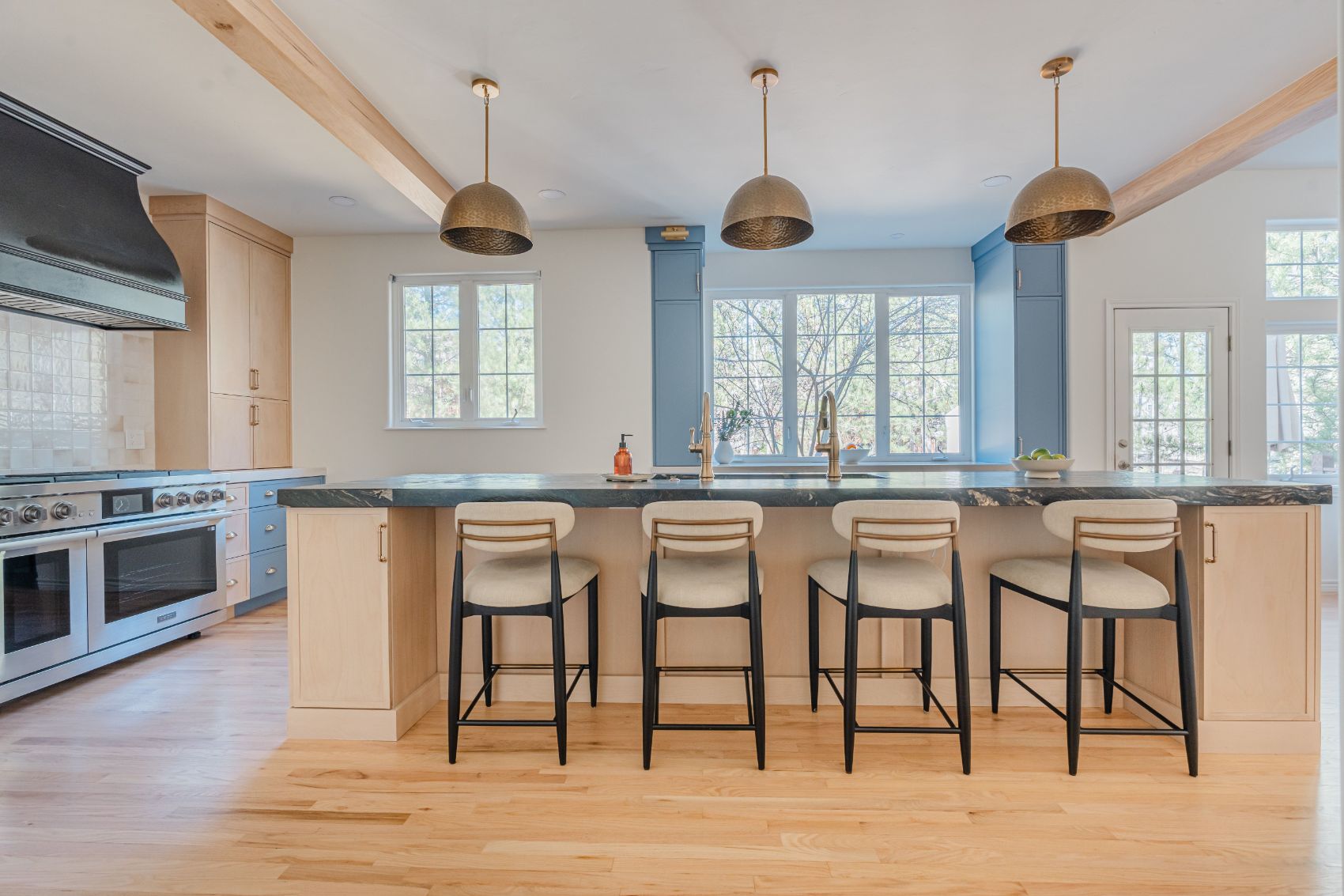 Castle Pines kitchen with maple island seating